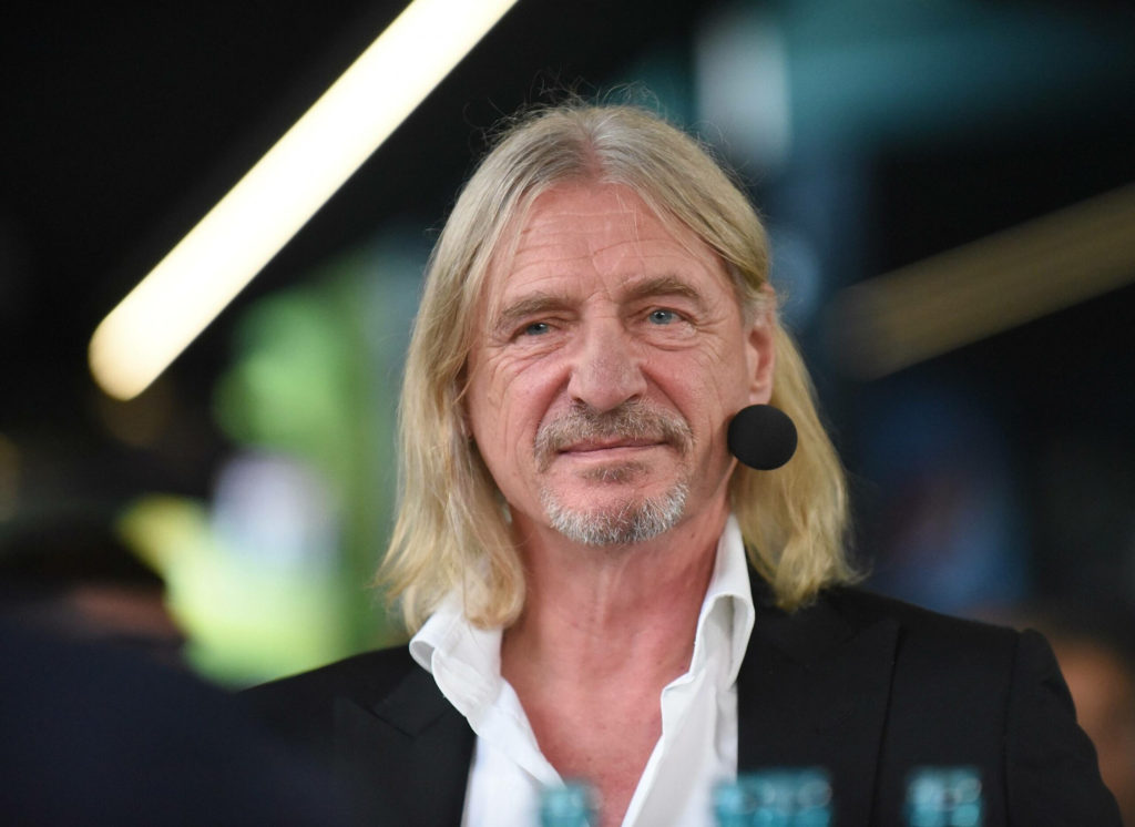 alt="Frank Otto auf einem Event als engagierter Medienunternehmer"
